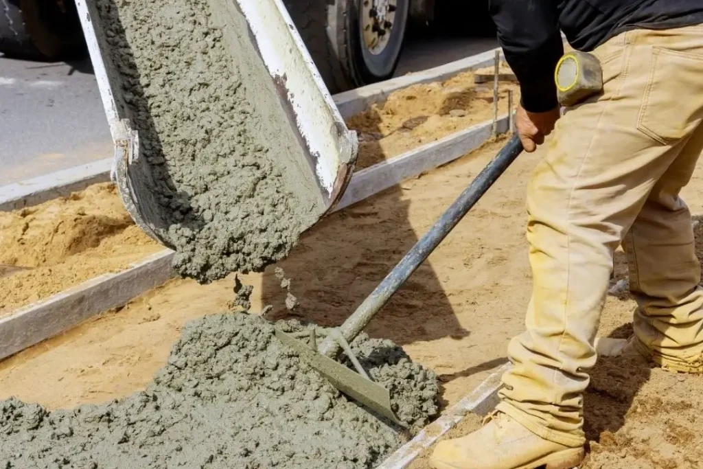 pouring concrete during construction